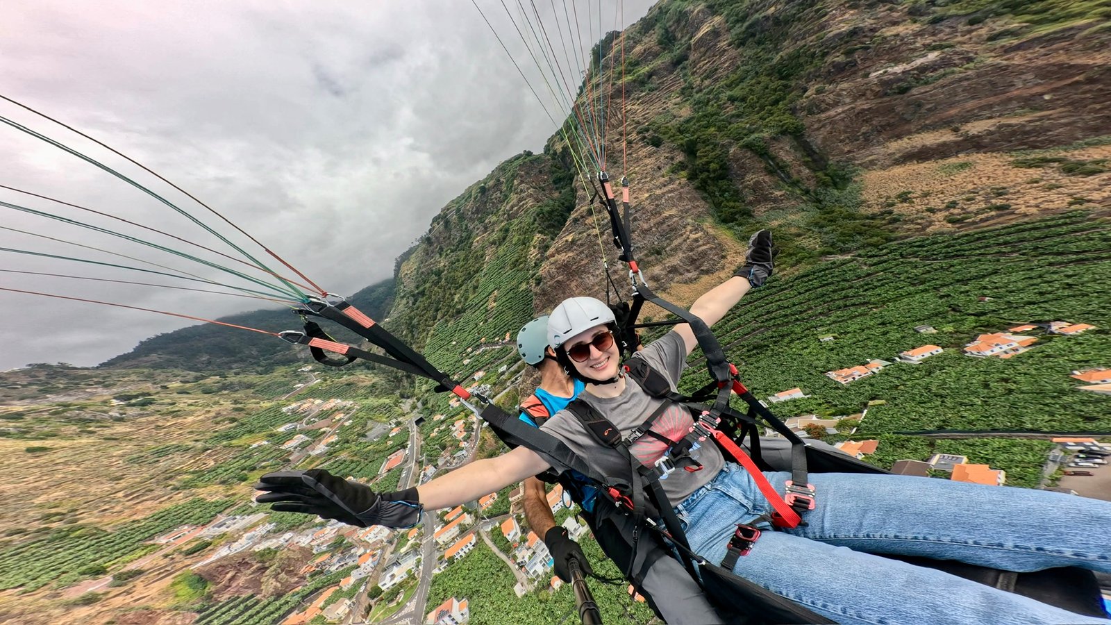 Guests enjoying a tandem paragliding flight